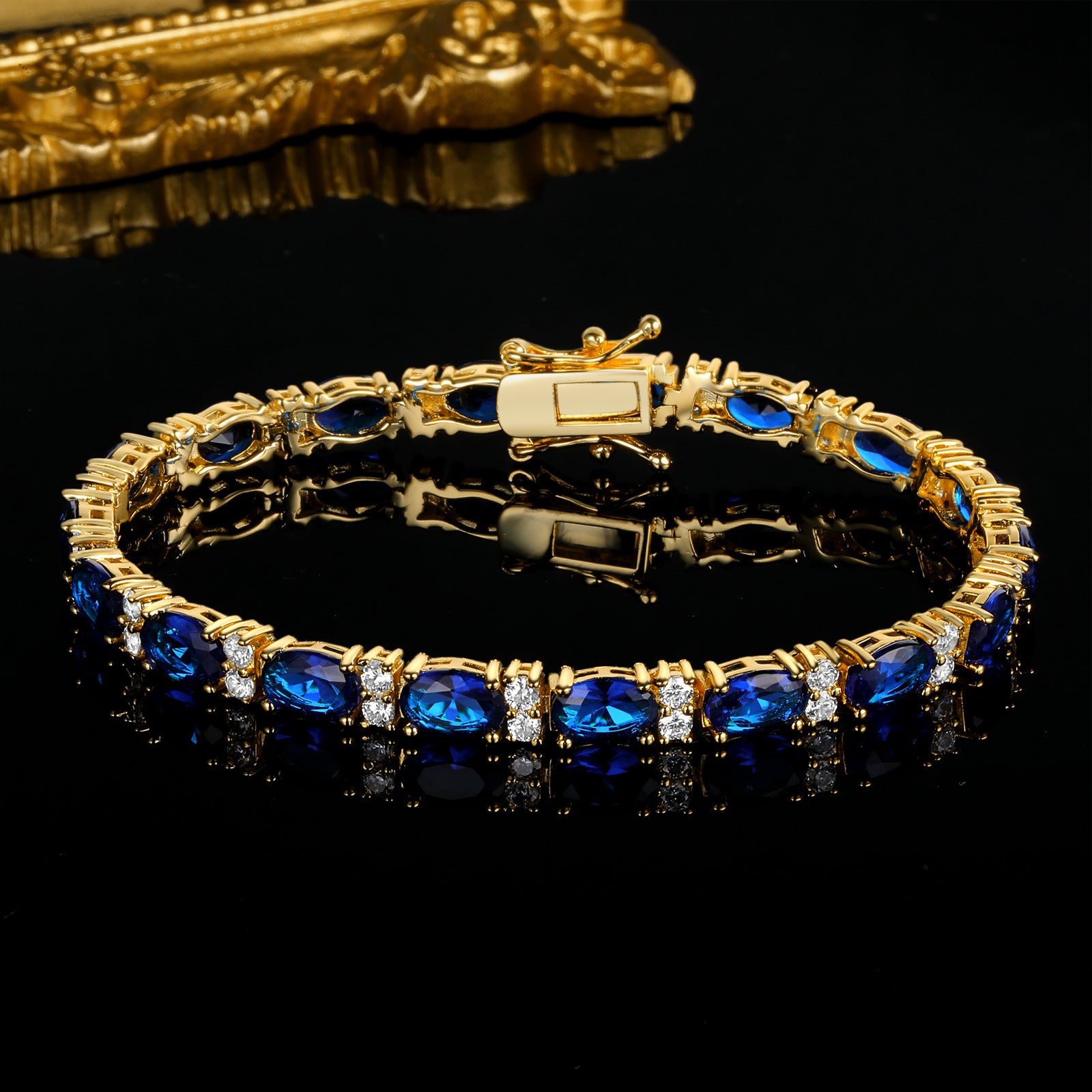 Alternating Oval Blue Sapphire and Twin White 5mm Golden Tennis Bracelet in Prong Setting with Box Clasp Safety Latches