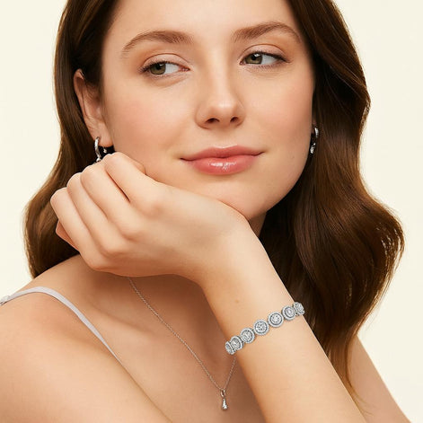 Round Brilliant Silver Tennis Bracelet in Pavé Halo Setting with Box Clasp Safety Latches
