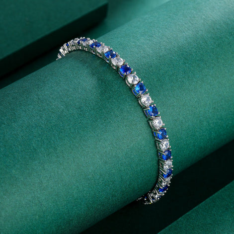 Dual Tone 4mm Tennis Bracelet in Alternating Blue Sapphire and White Brilliant with Box Clasp Safety Latches